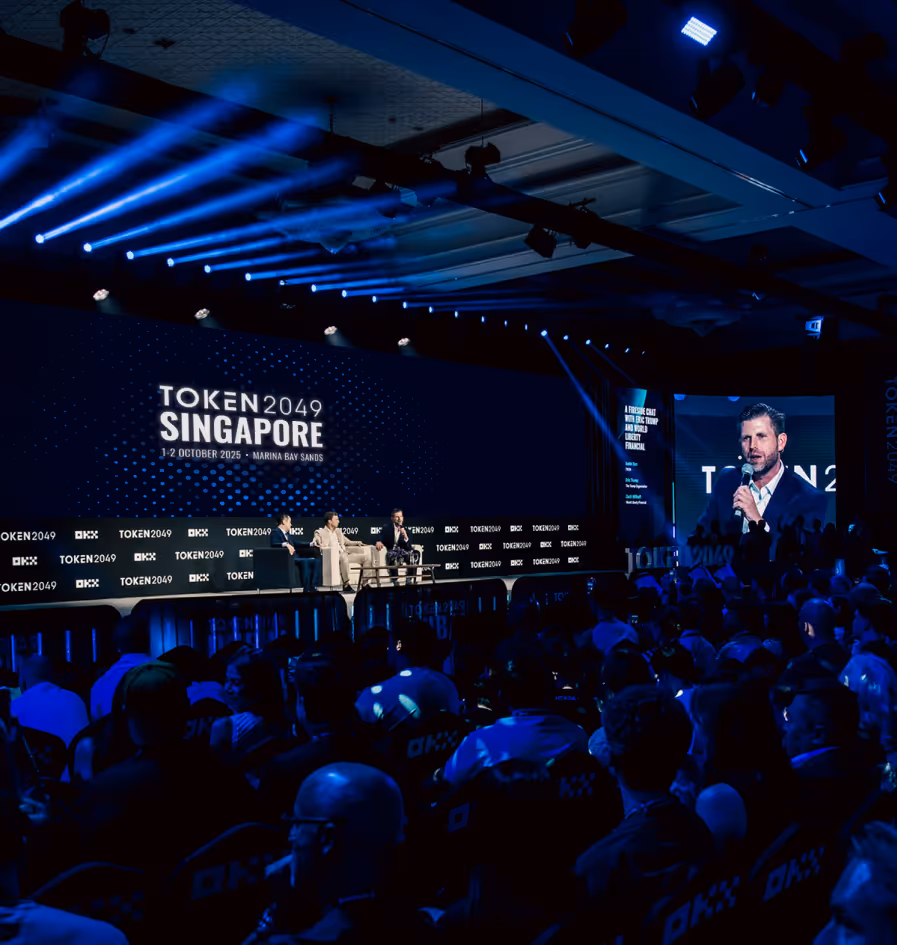 Audience watching a panel on the TOKEN2049 Singapore 2025 stage